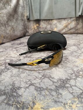 Oakley Black & Gold Performance Sunglasses with Mirrored Lenses